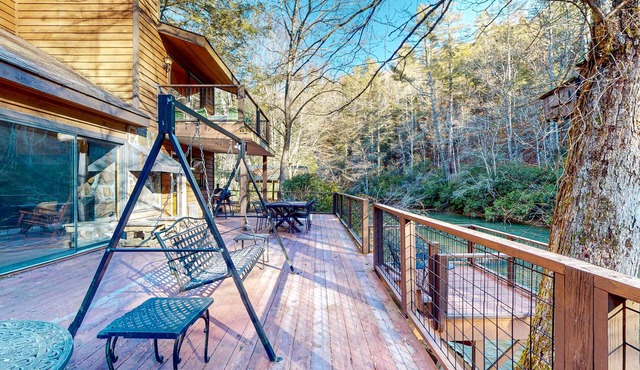 Dog-friendly, riverfront retreat with game room, washer/dryer, wraparound deck