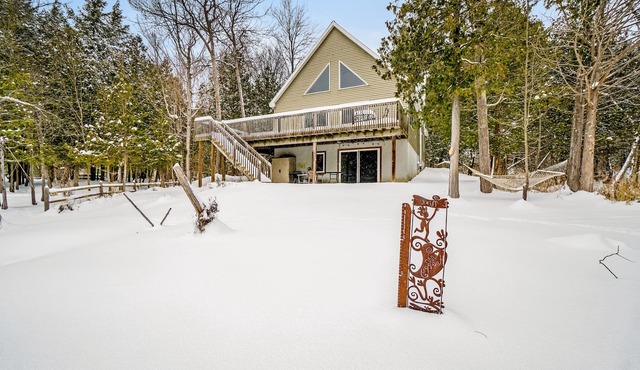 Dog-friendly riverside retreat with canoe, kayaks, paddle-board, and wood stove