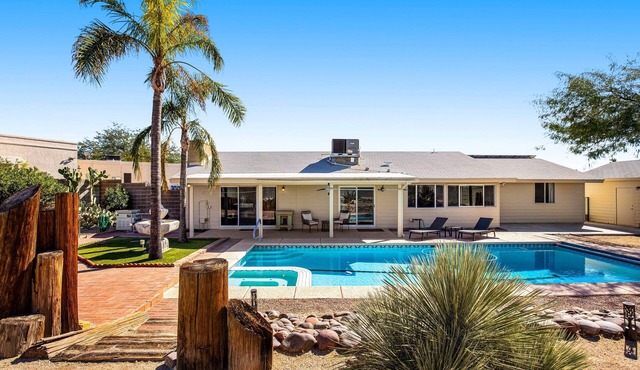 Dog-friendly sunshine stay with private pool, spacious yard, central AC & W/D