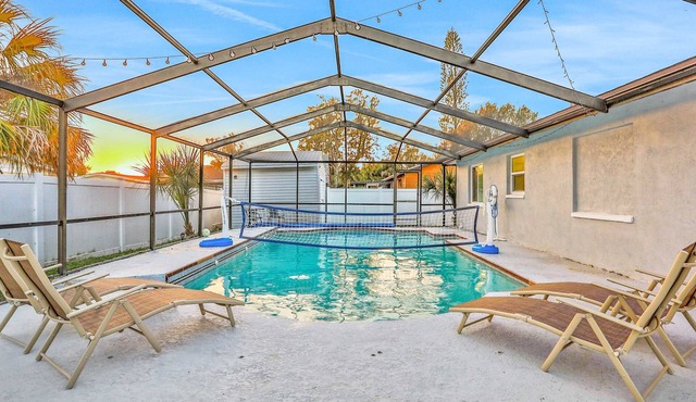 Dog friendly tropical stay with a private pool grill game tables and central AC