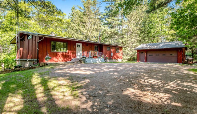 Dog-friendly, lakefront home with dock, kayaks, canoe, bike & fireplace