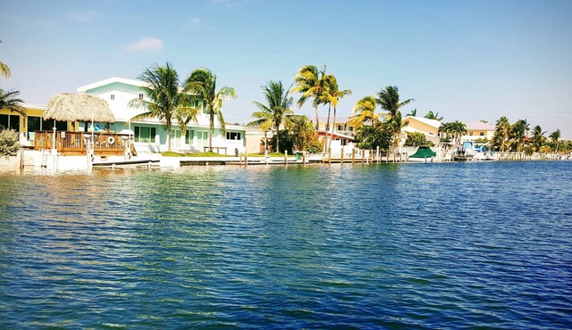 Dog-Friendly Waterfront House with 37ft Dock and Cabana Beach Club & Pool