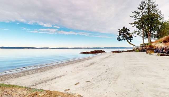 Dog-friendly water view home with private beach, firepit, kayaks, deck, & grill