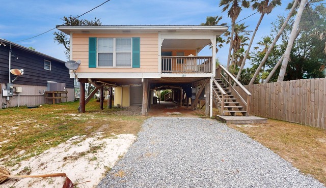Dog-friendly waterfront retreat with a washer/dryer, AC, patio, & outdoor shower
