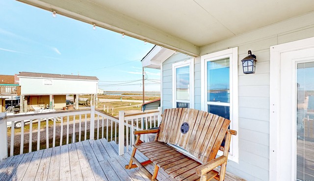 Dog-friendly waterfront home with balcony, grill, water views, washer/dryer, AC