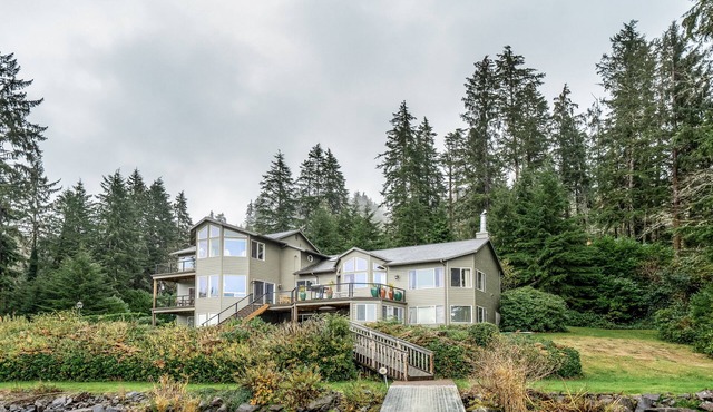 Dog-friendly waterfront house w/a private hot tub, game room, & dock