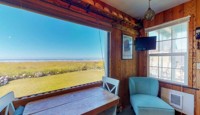 Dog-friendly waterfront studio cottage with private beach access