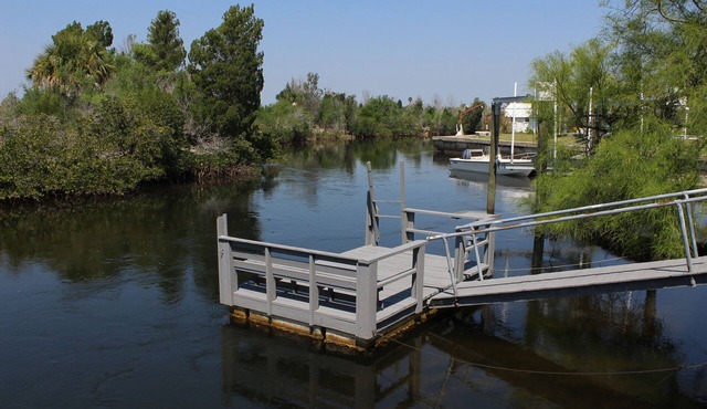 Dolphin Cove Getaway - 3 bedroom waterfront, floating dock, with water "toys"!