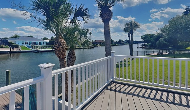 Dolphin View Oasis | Spacious Pet-Friendly Canal-front Home with Game Room+ Dock
