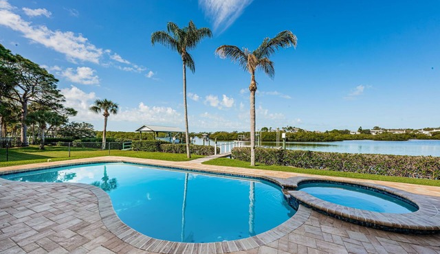 Dolphins in your backyard! Peaceful waterfront oasis w/sparkling pool & hottub.