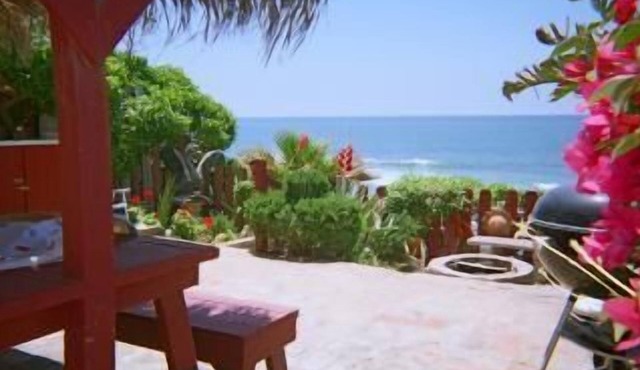 Dolphinview is a 3 bedroom, 2 bath beachfront home with private steps