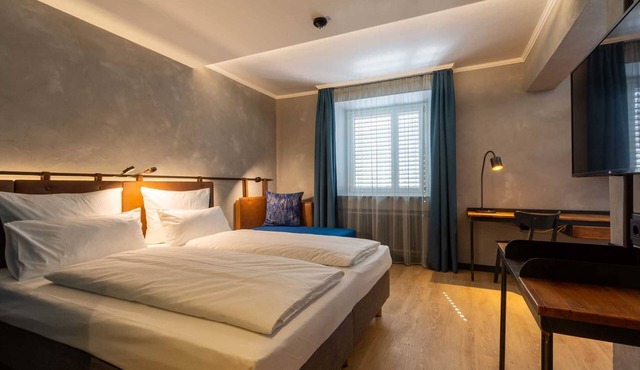 Doppelzimmer Deluxe - Unsöld's Factory Hotel in München