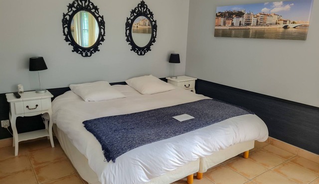 Double room overlooking landscaped garden and swimming pool in charming house