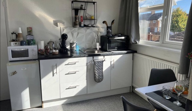 Double room with a small kitchen