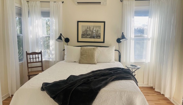 Downtown Cottage Style Home! Vintage vibes and comfortable amenities.
