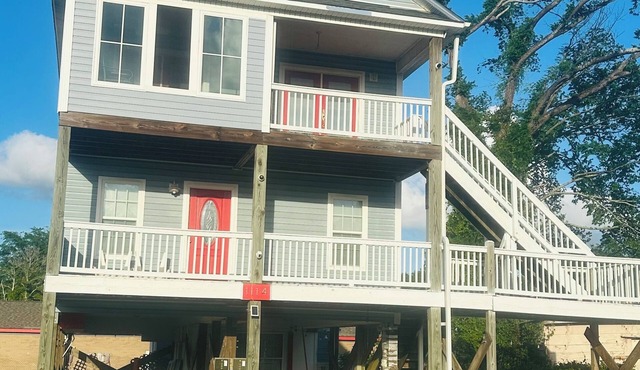 Downtown duplex on stilts.