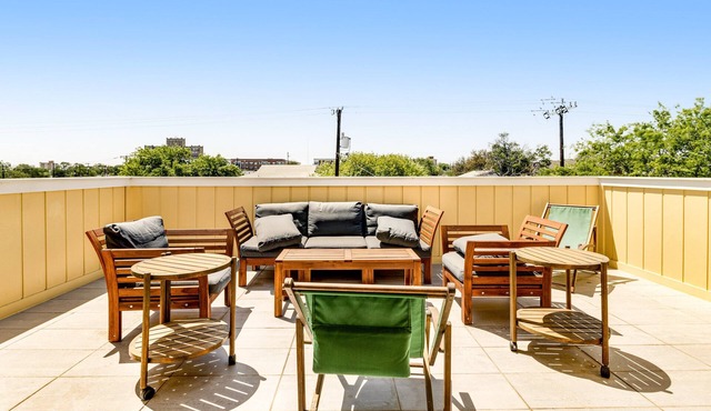 Downtown home with WiFi, central AC, furnished rooftop deck, and full kitchen