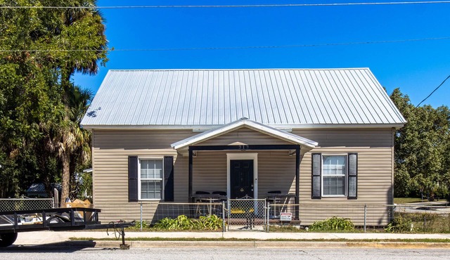 Downtown three bedroom house with game room and outside lounge area.