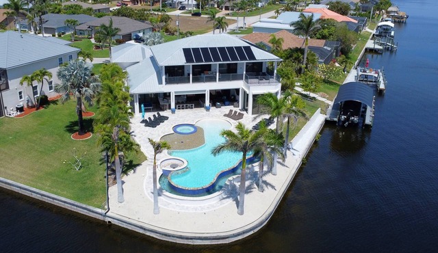 Dream Home Vacation! Stunning Waterfront! Luxurious Resort-Style Lagoon Pool, Spa & Outdoor Living!