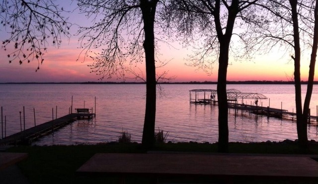Dream sunsets from this two bedroom lakeside cabin