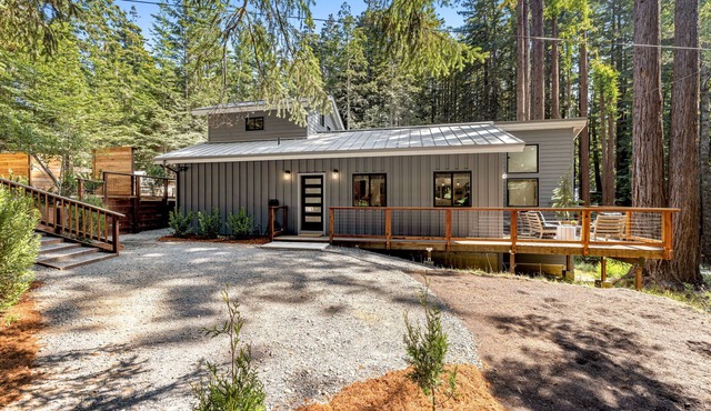 Dreamy home with expansive patio & alfresco dining, private hot tub, yard & W/D