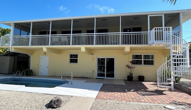 Duck Key house waterfront with 75 Lf of dock and a pool 3 bedrooms 3 bathrooms