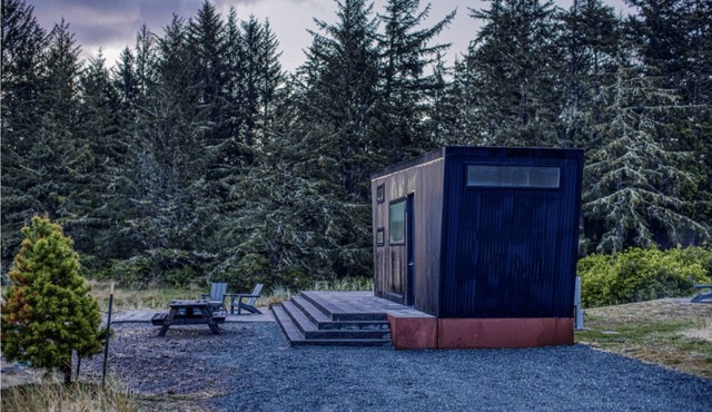 Dune Cabin - The Dune Cabin is well-appointed and uniquely designed and comfortably sleeps 6 guests. Private bedroom with queen bed, open loft with twin beds, and dinette that converts to a full size bed