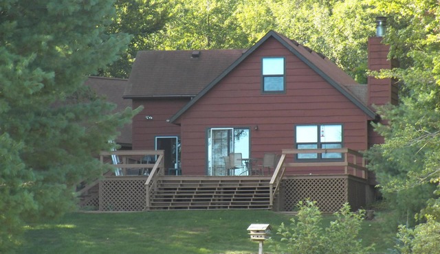 Duneview Lake House on a private and peaceful setting on Hamlin Lake