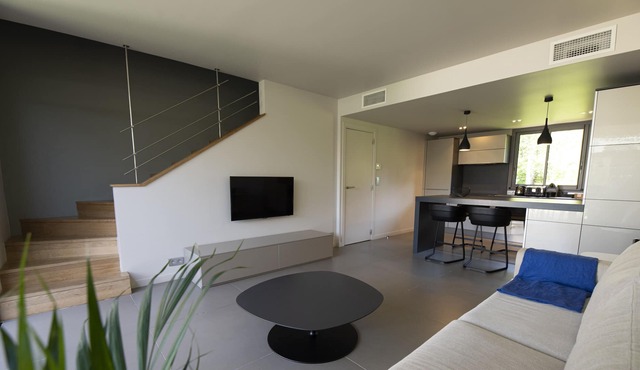 Duplex apartment with private patio Santa Giulia