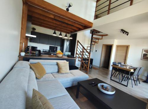 Duplex moderne, chaleureux au calme à Toison d'or