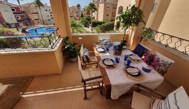 Duplex overlooking pools and mountains in Altaona Golf