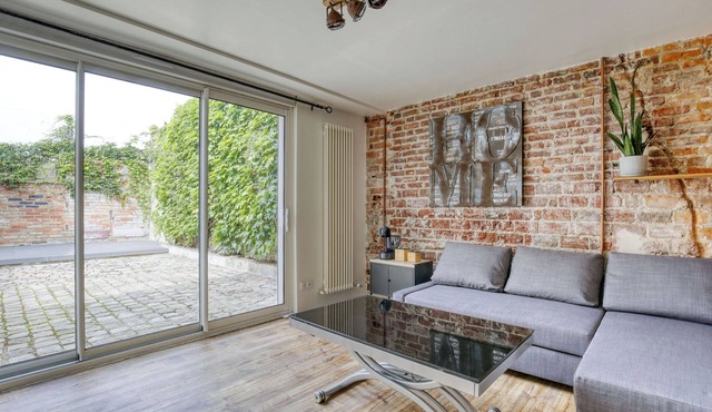 Duplex with sauna in a loft on the banks of the Oise, 5 minutes from public transport