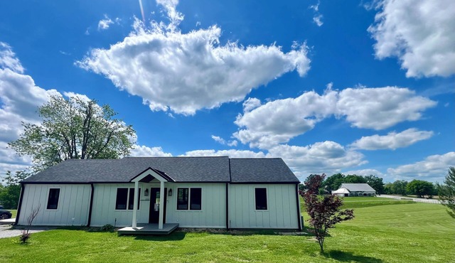 Eagles Crossing is a Newly Renovated 3-Bed Farmhouse with a Large Deck & Hot Tub