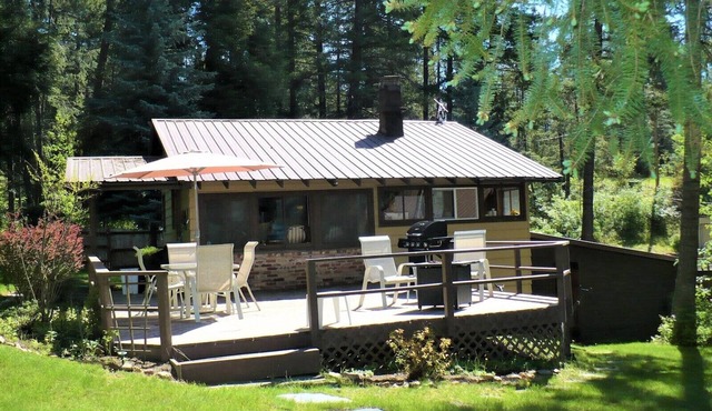 East Deer Lake waterfront cabin with sandy beach and large dock