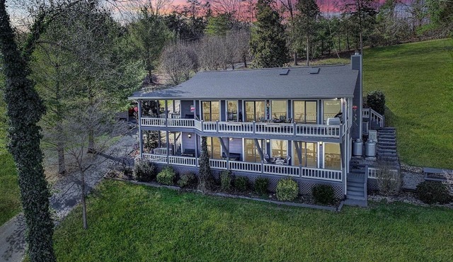 East Norris Point Breathtaking Lake View with Private Dock in Year Around Water