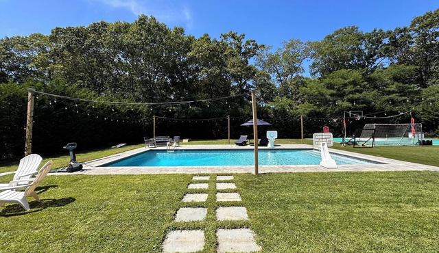 East Quogue dream with outdoor turf, sport court and more