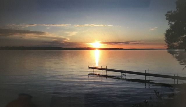 East Torch Lake cottage with beautiful sunsets!