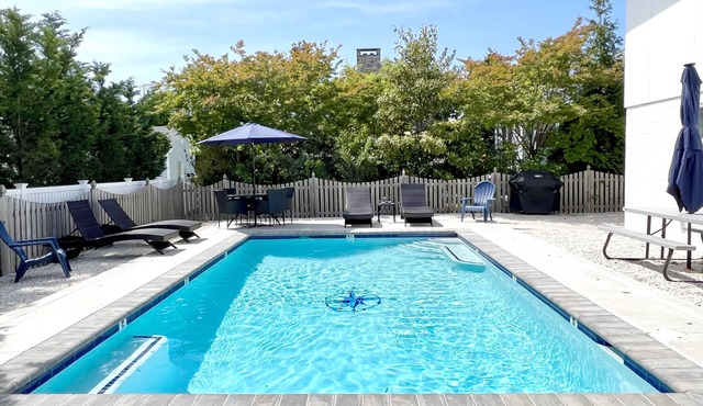 Easy Walk to Beach & Town. Private, heated pool!