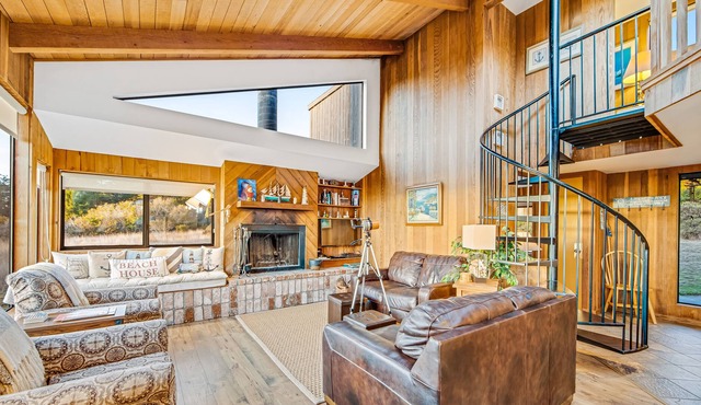 Eclectic coastal retreat w/ ocean view, private hot tub & spacious lofted layout