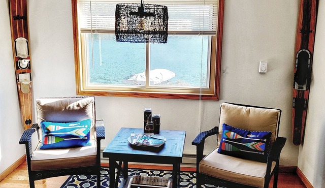 Eclectic getaway on Lake Tomahawk! Waterfront cabin by trails and downtown LT!