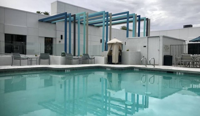 Eco-Certified Guest Room with Heated Pool, On-Site Dining, and Easy I‑10 Access