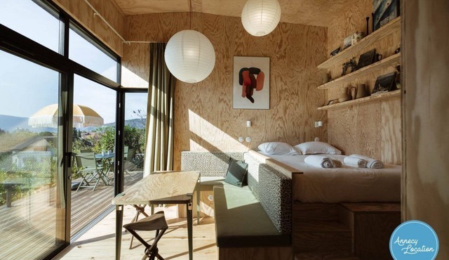 Ecolodge Acmé vue lac et bain nordique