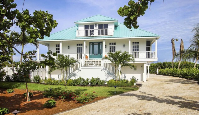 Elegant 4-Bedroom Beachfront Estate with Private Pool & Spa