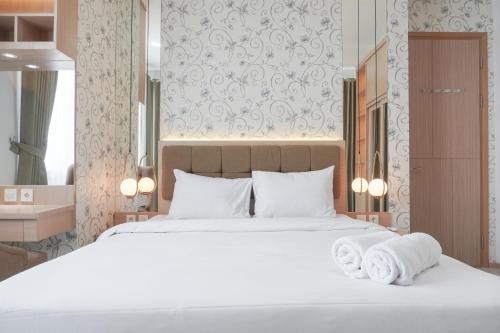 Elegant and Comfort Living 2BR at Samara Suites Apartment By Travelio
