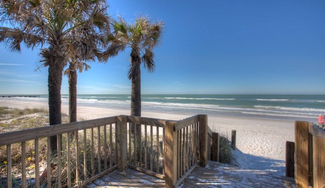 Elegant Beachfront Condo w/pool! Walking distance to many restaurants and shops