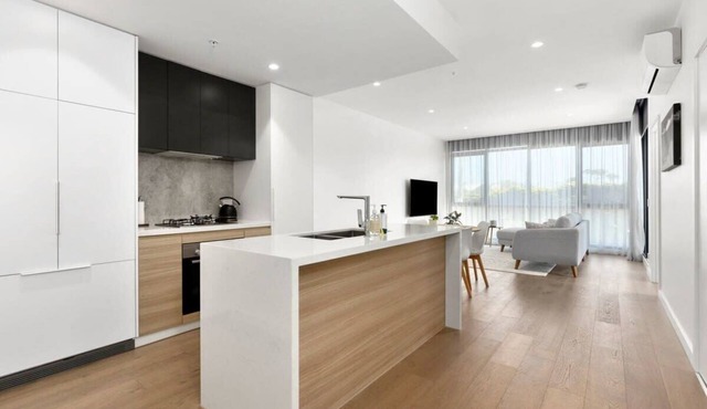 Elegant coastal living near shops and surf beach