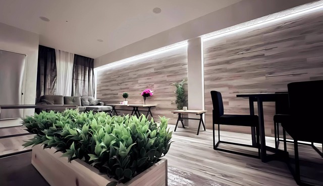 “Elegant Condo Steps from Americana”
