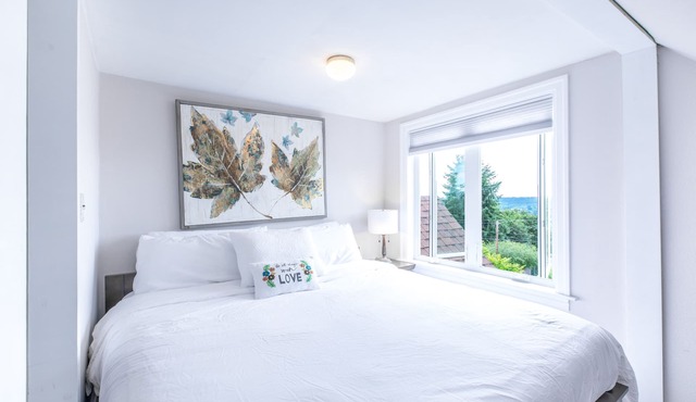 Elegant French Tudor Retreat with Stunning City Views!