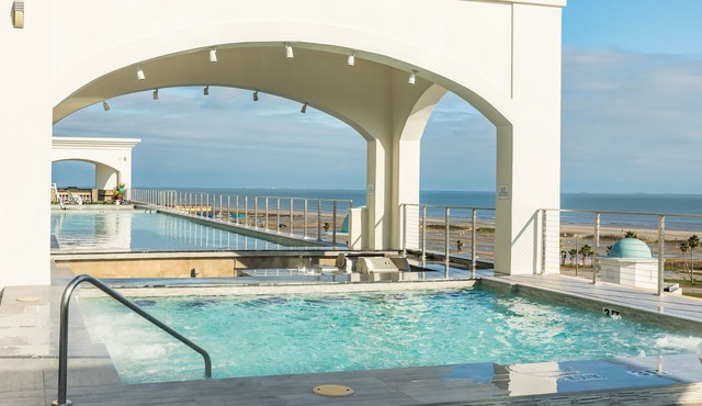 Elegant gulf escape with heated pool, hot tub, beach access, & water views