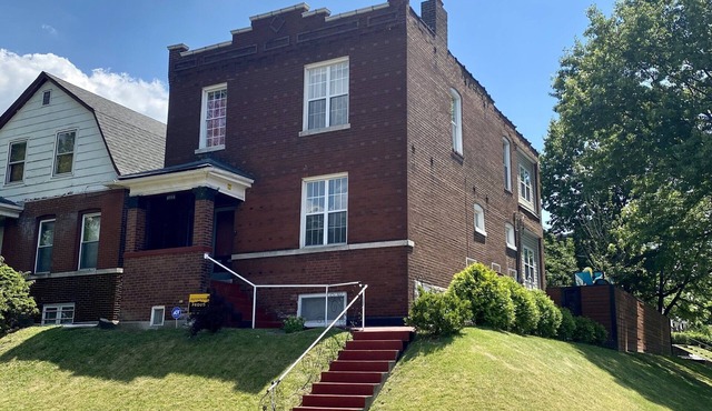 Elegant home with pool, fenced yard, full kitchen & theater.